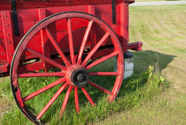 Old red wooden wheel calash