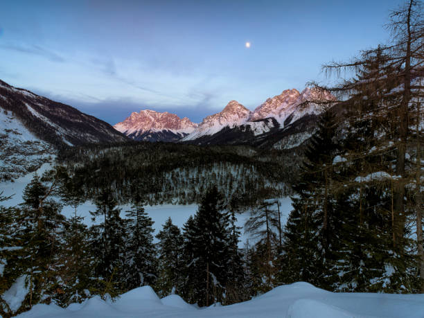 Hochkonig mountain range in Austria. Alps mountains on a sunny day. Mountain landscape. Blue sky with some clouds above beautiful summits alpine range Hochkonig in Austria Tyrol