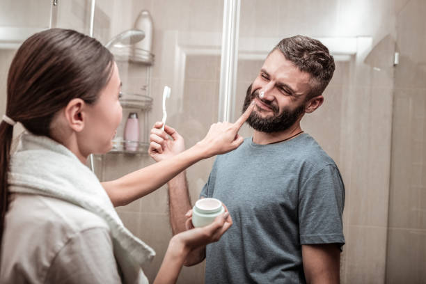 istock Nice joyful man smiling to his girlfriend 1098010110