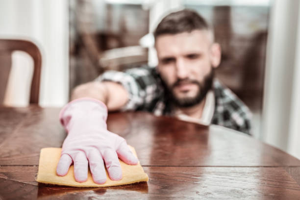 istock Selective focus of a male hand in a rubber glove 1098012178