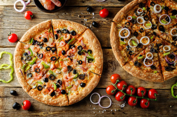 istock Pizza with shrimp, olives, green pepper and onion 1098012404