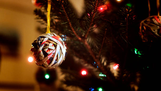 Christmas Recycling paper bauble on a christmas tree