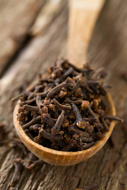 istock cloves in a wooden spoon 1098020664