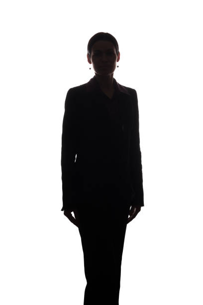 Young woman in suit look ahead - silhouette