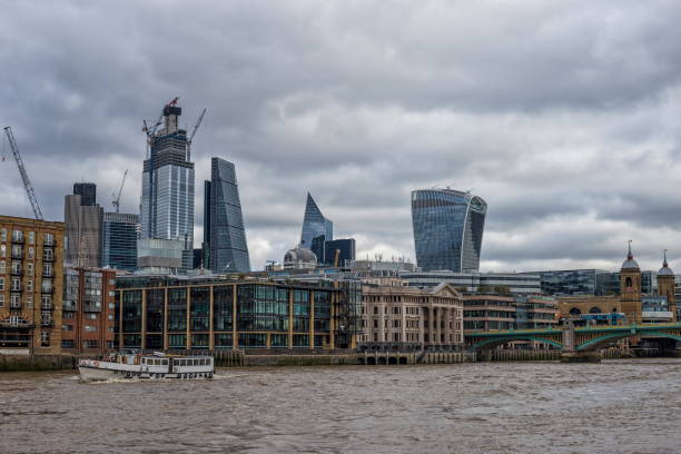 istock London skyline seen from the River Thames on a beautiful cloudy day 1098030806