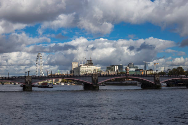 istock London skyline seen from the River Thames on a beautiful cloudy day 1098030846
