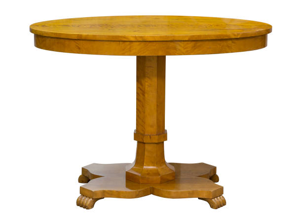 istock Vintage small oval hard wood table isolated on white 1098030898