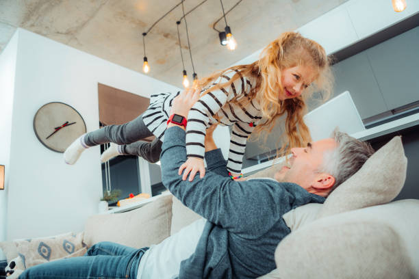 istock Cute small daughter with long hair feeling wonderful 1098031674