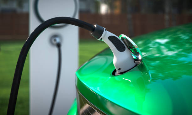 Charging your EV at home with a charging plug close up 3d rendering Charging your EV at home with a charging plug close up 3d rendering alternative fuel vehicle stock pictures, royalty-free photos & images
