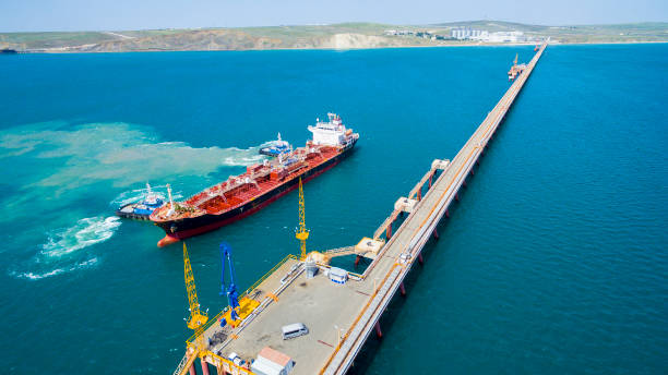 istock tanker moored to the port using tugs from drone 1098033832
