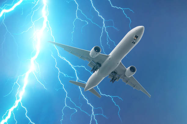 istock Powerful lightning strike in a thunderstorm near the plane 1098033954
