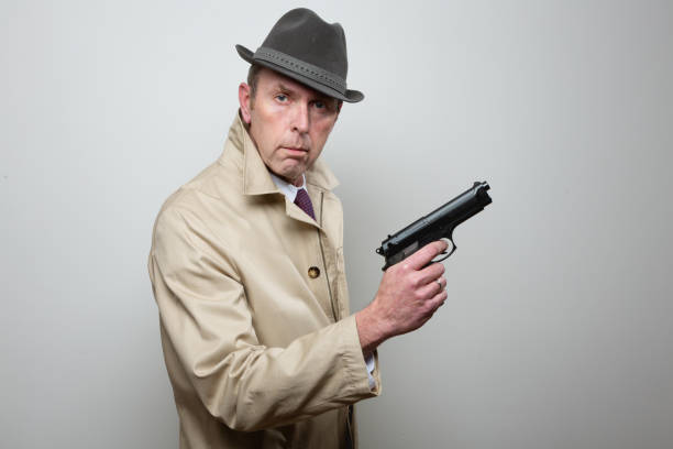 istock Retro style gangster with handgun 1098034176