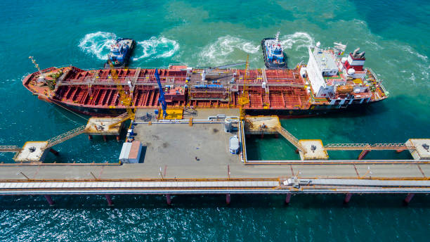 istock tanker moored to the port using tugs from drone 1098034346