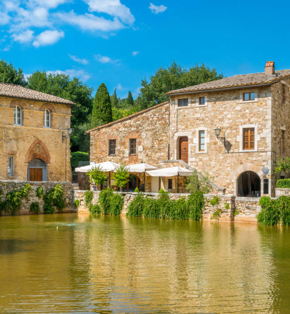 the picturesque bagno vignoni, near san quirico d'orcia, in the province of siena. tuscany, italy. - vignoni imagens e fotografias de stock