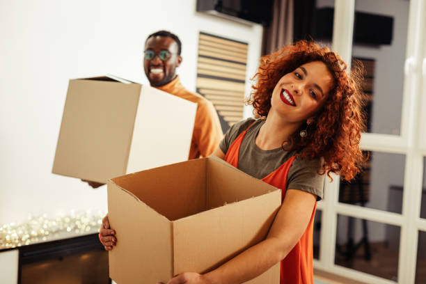 istock Happy excited couple feeling nice while moving to new house 1098053170