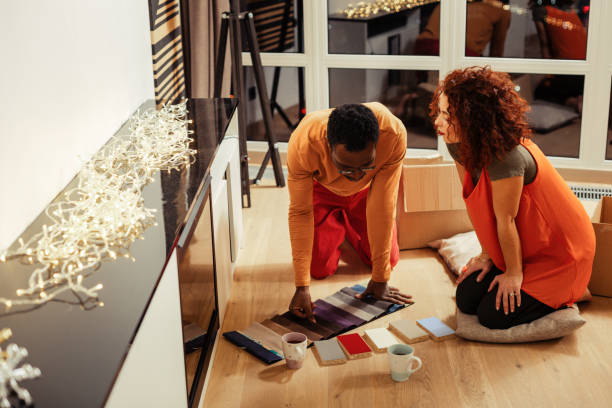 istock African-American interior designer thinking about renovation in his house 1098053234