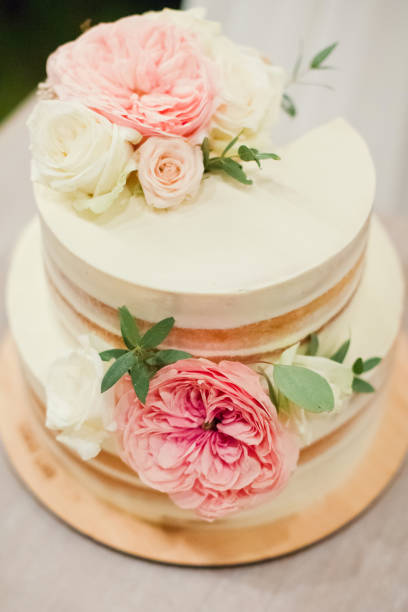 istock wedding cake decorated with flowers 1098058032