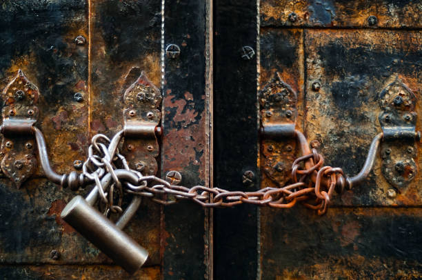 istock vintage lock on a rusty loop on an iron door, copy space, concept of authentic objects 1098060280