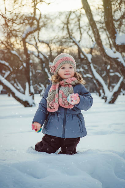 istock Cute boy in winter park 1098061022
