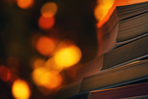 istock old books gold bokeh 1098061356