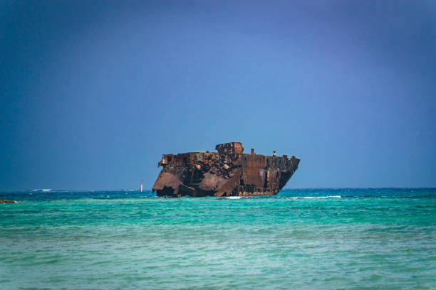 istock Rusty ship in the middle of the ocean 1098061570