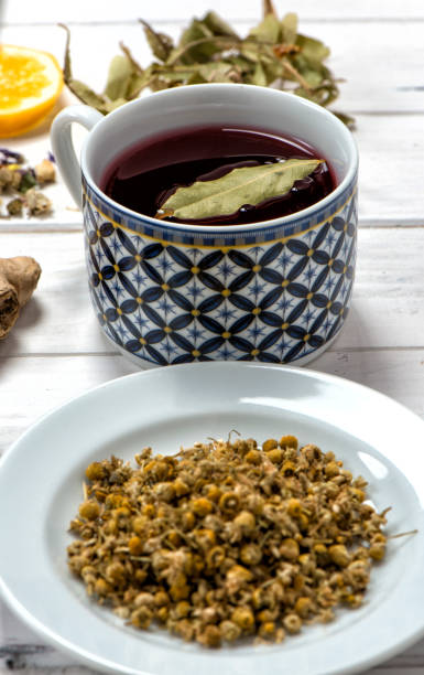 istock Dried Herbs With Cup Of Herbal Tea 1098066530