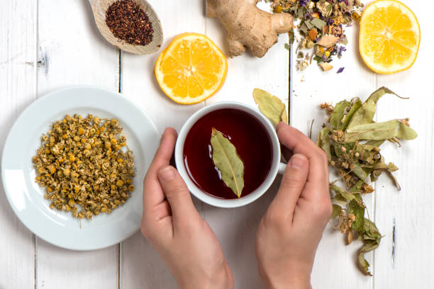istock Dried Herbs With Cup Of Herbal Tea 1098066546