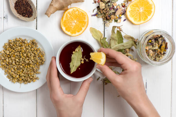 istock Dried Herbs With Cup Of Herbal Tea 1098066548