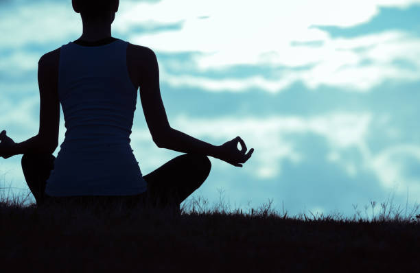 istock Outdoor meditation at sunset 1098082112
