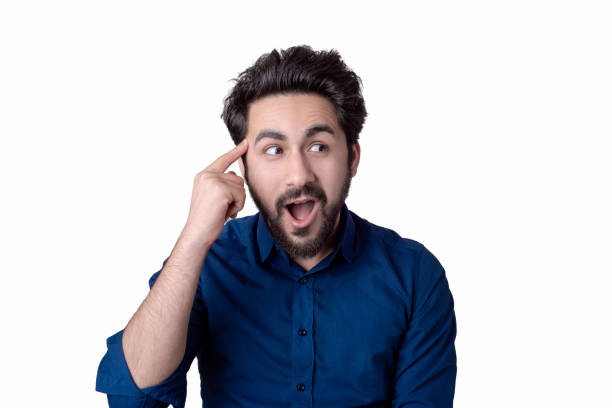 Portrait of a thinking young man looking away.