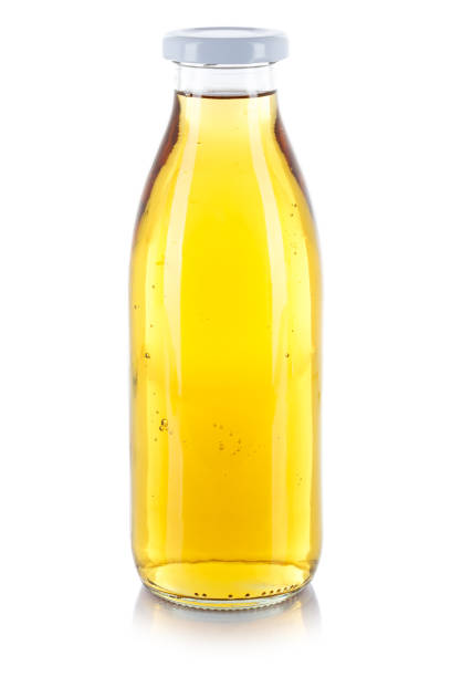 istock Apple juice drink bottle isolated on white 1098088860
