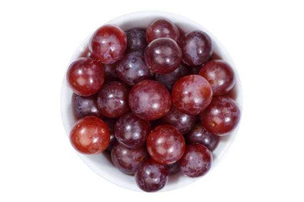 istock Grapes red fruits fruit from above bowl isolated on white 1098089064