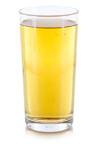 istock Apple juice drink glass isolated on white 1098089190