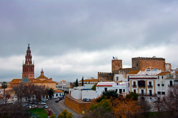 istock View of the ancient castle and church, overcast 1098089618