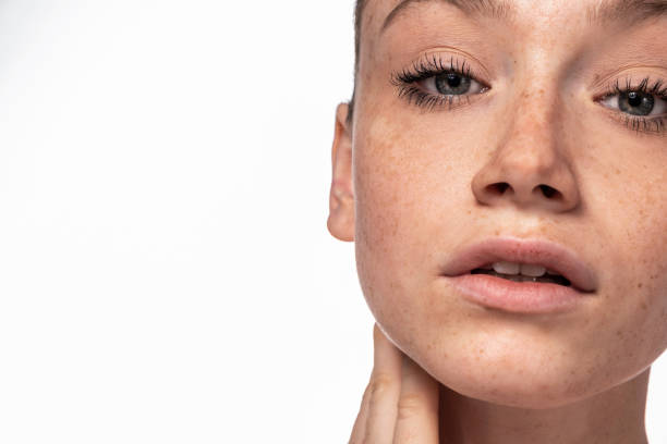 istock Beautiful young face with freckles. 1098096254