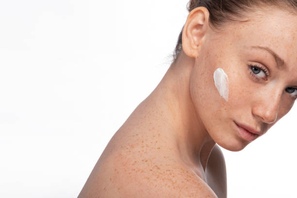 istock Beautiful young face with freckles. 1098096292
