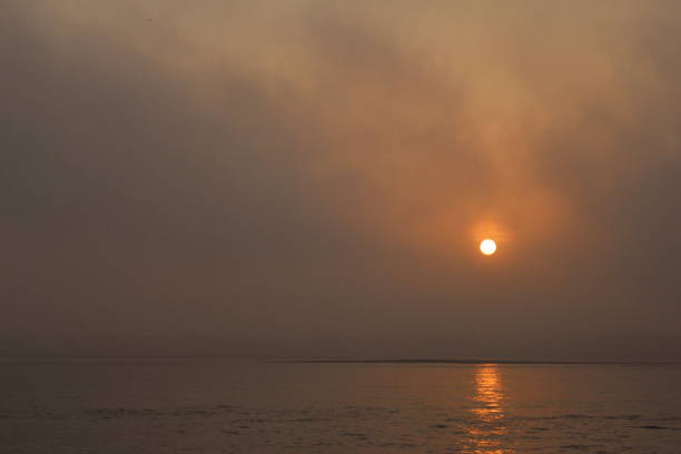 istock Sunrise over the river Ganges in Varanasi, India 1098101482