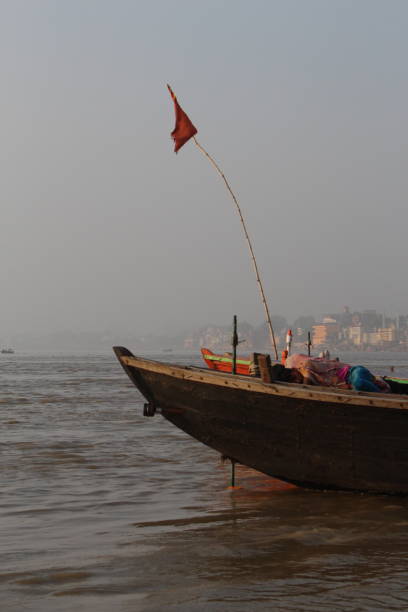 istock Young boy sleeping in a boat on the river Ganges in Varanasi, India 1098101506