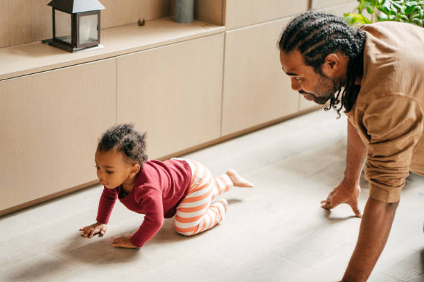istock Father playing with baby daughter 1098111920