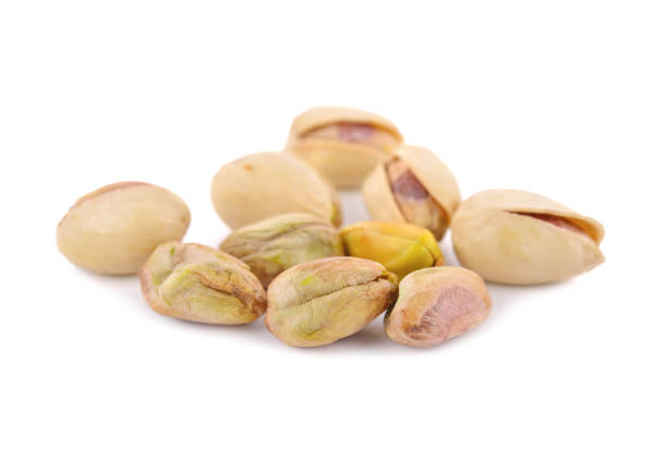 istock dried pistachios on white background 1098114382