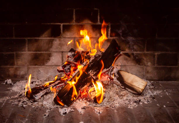 istock the fire burns in the fireplace close 1098116576