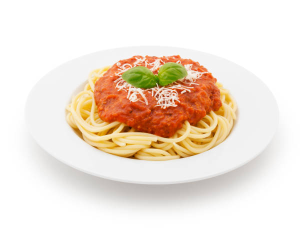Spaghetti Bolognese on Plate Spaghetti bolognese on plate with parmesan cheese and fresh basil isolated on white (excluding the shadow) Bowl of Spaghetti stock pictures, royalty-free photos & images