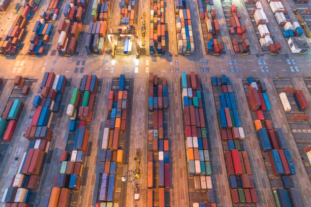 istock Logistics and transportation of Container Cargo ship and Cargo working crane bridge in shipyard 1098140412