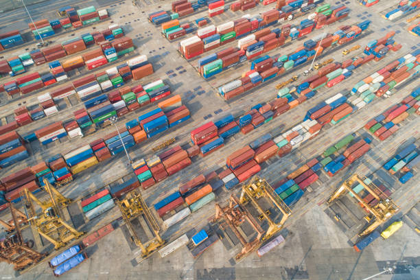 istock Logistics and transportation of Container Cargo ship and Cargo working crane bridge in shipyard 1098140460