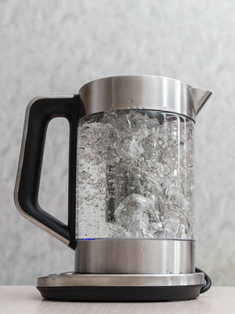 istock glass teapot with boiling water 1098144510