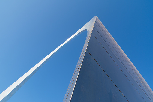 Abstract view of the Gateway Arch with brilliant blue skies in background.  St. Louis, Missouri, USA