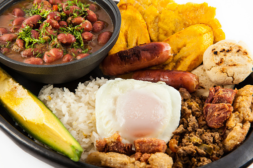Traditional Colombian dish called Banda paisa: a plate typical of Medellin that includes meat, beans, egg and plantain