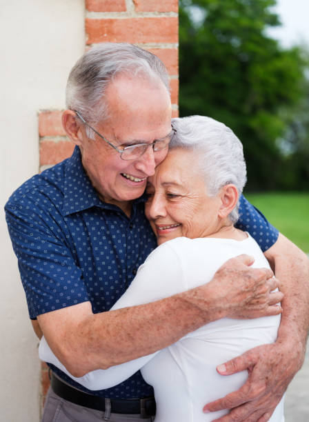 istock Senior couple hugging 1098154060