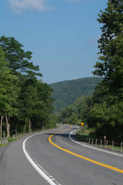 istock Summer drive on a mountain road 1098155632