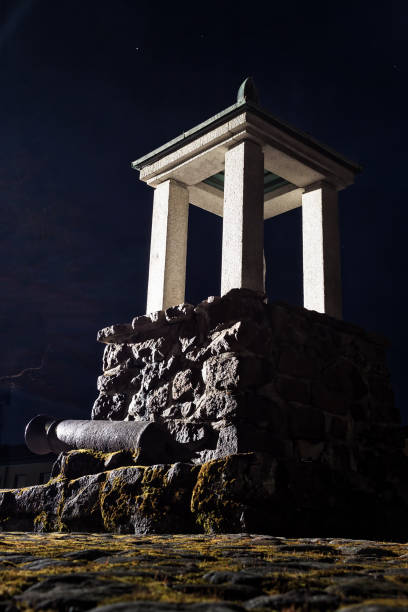 Old War Memorial An old war memorial on a spring night at Lappeenranta, Finland. The place was a battle field two hundred years ago in a war between Sweden and Russia. lappeenranta stock pictures, royalty-free photos & images